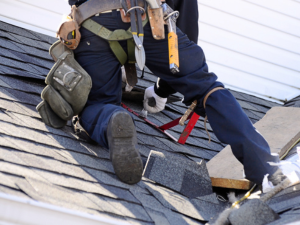 Roofers-in-Lenoir-preparing-a-home-for-winter-with-snow-in-the-background